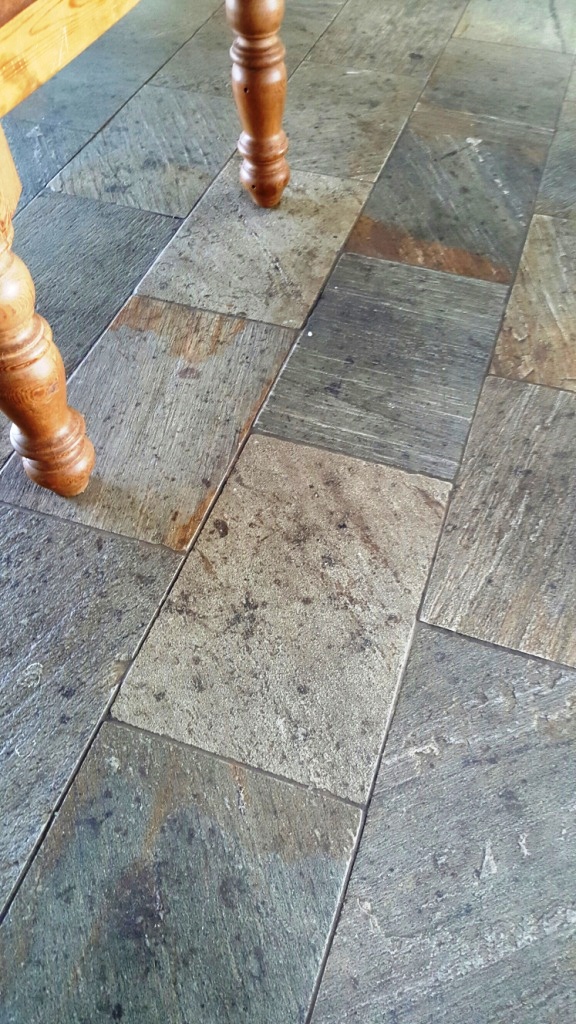 Riven slate floor before cleaning at Boston farmhouse